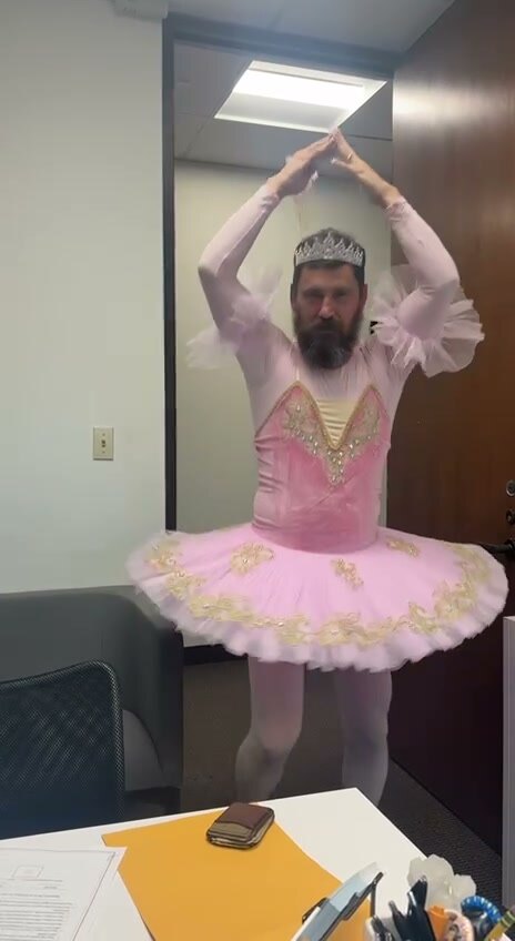 Bearded Ballerina performing a hotel lobby singing telegram in Dallas Fort Worth